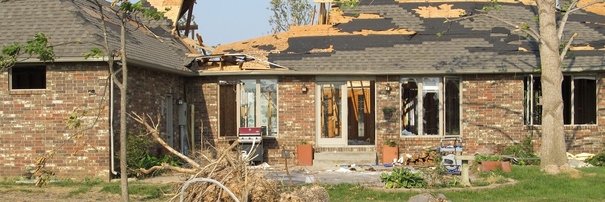 A house that has been damaged by a tornado