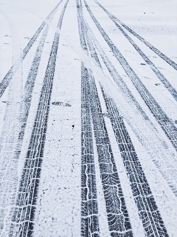 Snowy-Road-Winter-Roads-Tire-Tracks-Blog.jpg